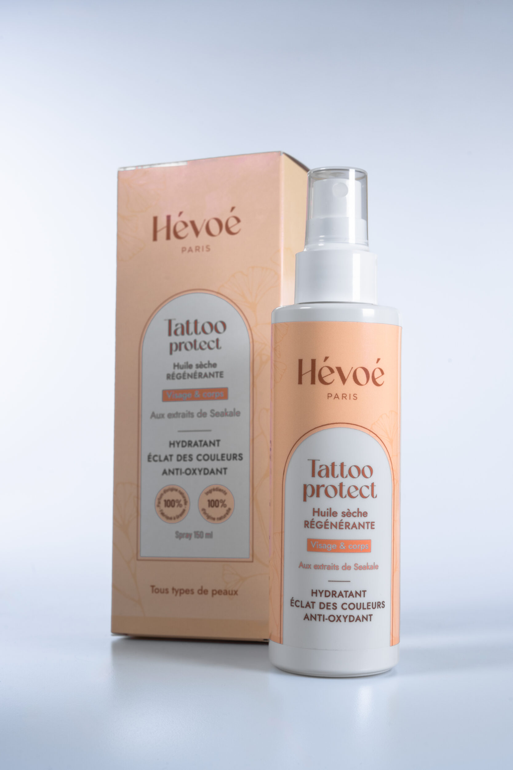 Huile tatouage et massage - Protection et éclat quotidien 2 Huile tatouage Tattoo Protect Hévoé avec packaging – huile sèche régénérante à la vitamine E pour hydratation et protection de la peau
